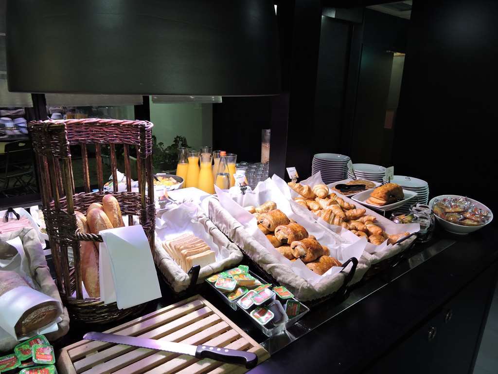 坎姆盘奈奥彻酒店 欧什 餐厅 照片
